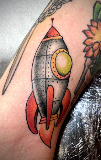 Explore rising sun tattoo ideas, creative tattoo ideas in New Orleans, available at TOUGH LOVE TATTOOS