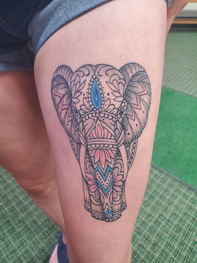 Explore cross tattoo ideas for women, creative tattoo ideas in Somerset, available at Bodeans Tattoos