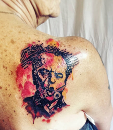 Explore mens tattoo ideas small, creative tattoo ideas in Benton, available at Spectrum Tattoo