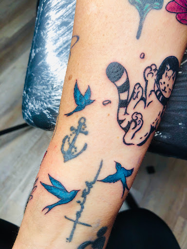 Explore 100 dollar tattoo ideas, creative tattoo ideas in North Tonawanda, available at Dark Side Ink Tattoo Studio