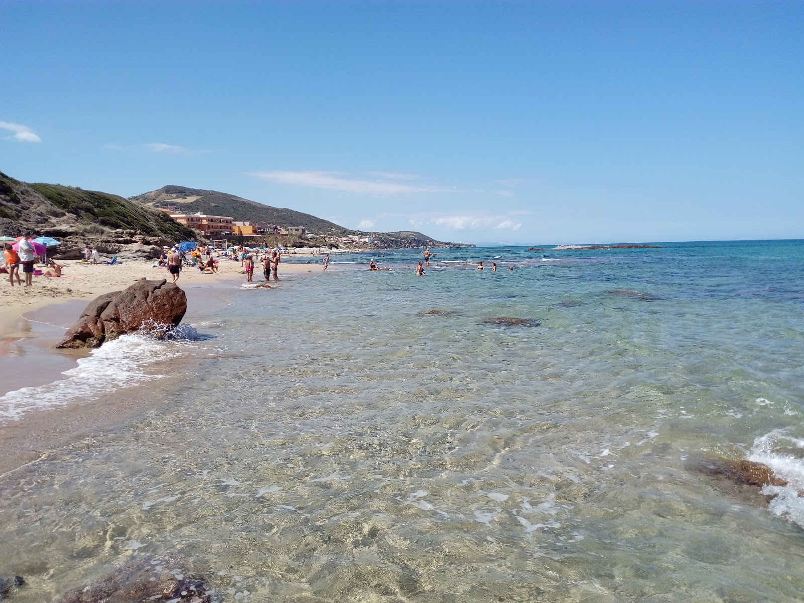 Foto di Spiaggia di Ampurias con una superficie del sabbia beige