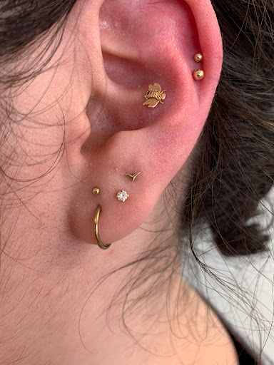 Explore tattoos ideas on back, creative tattoo ideas in Omaha, available at Sushi Balloon Body Piercing