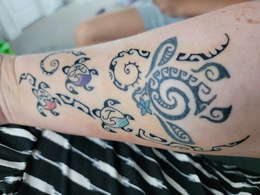 Explore libra tattoo ideas for men, creative tattoo ideas in Kihei, available at Paradise Tattoo