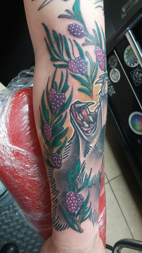 Explore dainty flower tattoo ideas, creative tattoo ideas in Freeport, available at Broken Moon Tattoos