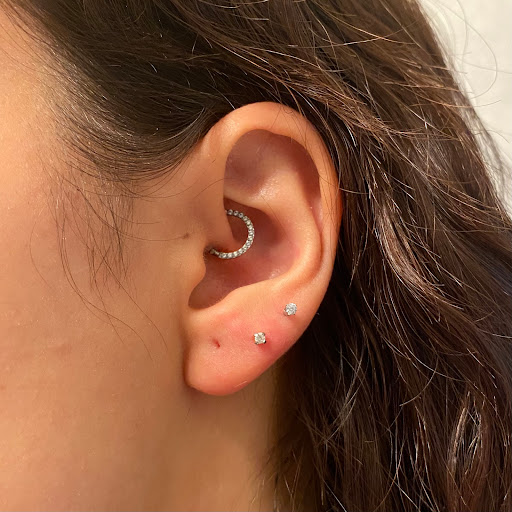 Explore flower back tattoo ideas, creative tattoo ideas in Tucson, available at Sacred Art Tattoo Studio