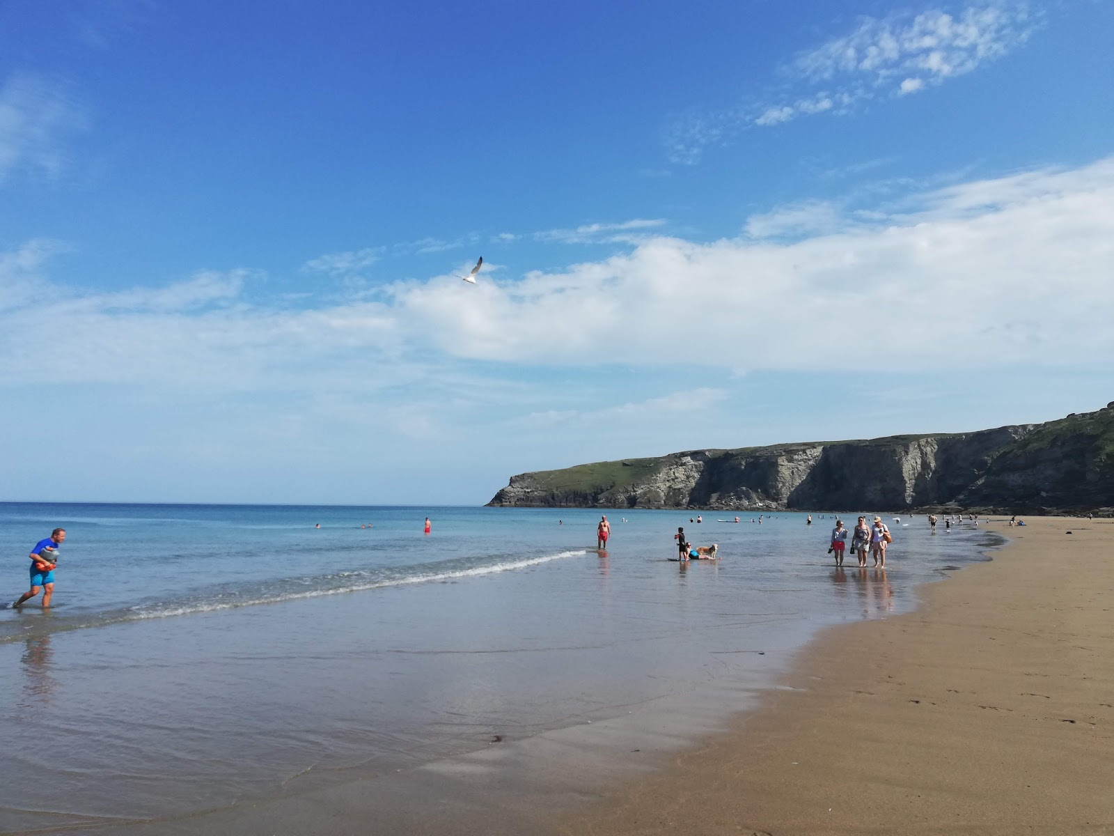 Fotografie cu Trebarwith Beach cu o suprafață de nisip gri