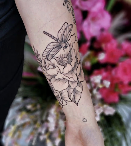 Explore ideas for elbow tattoos, creative tattoo ideas in Valdosta, available at Acid Ink Tattoos