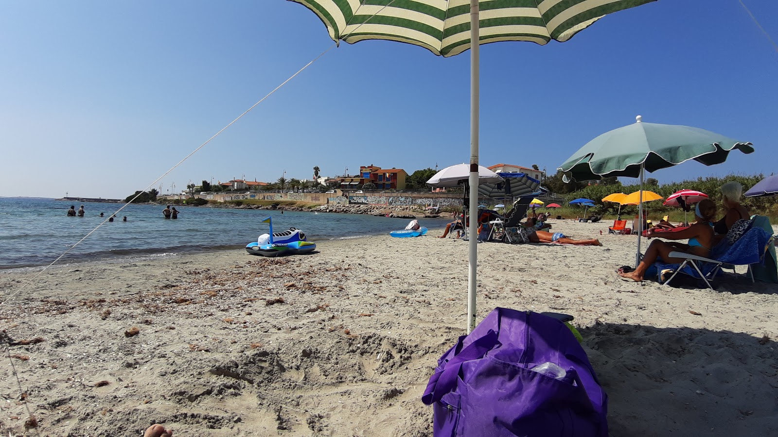 Fotografija Spiaggia di Portoscuso z ravna obala