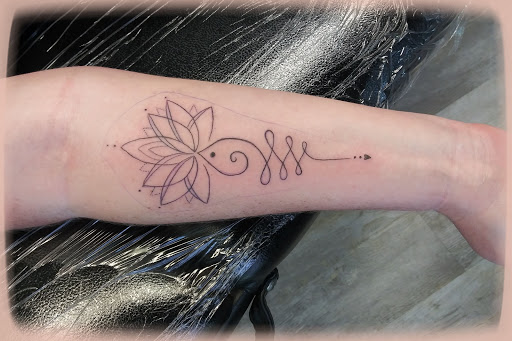 Explore flower half sleeve tattoo ideas, creative tattoo ideas in La Crosse, available at La Crosse Tattoo