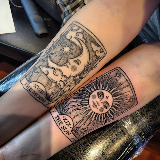 Explore lion sleeve tattoo ideas, creative tattoo ideas in Corning, available at Prisma Ink Tattoos & Piercings