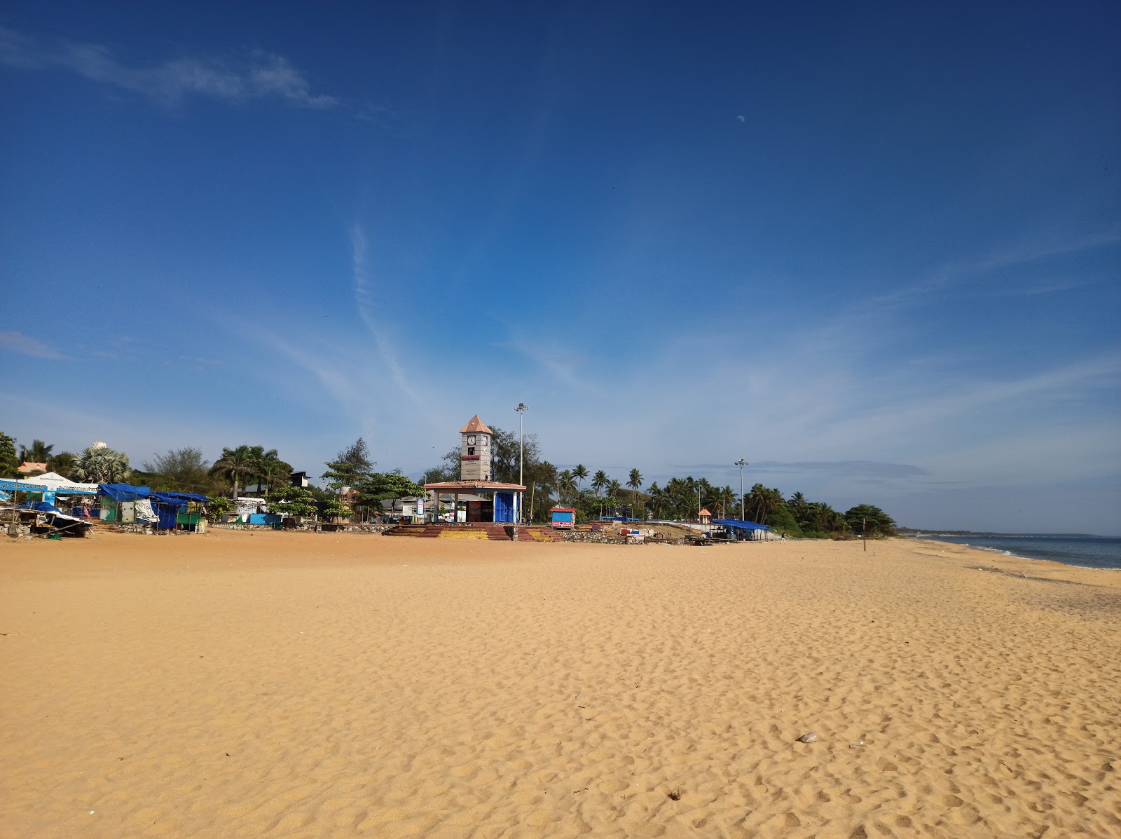Photo de Kollam Beach avec un niveau de propreté de partiellement propre