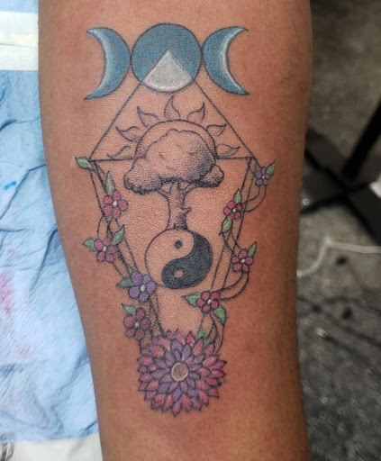 Explore back of ear tattoo ideas, creative tattoo ideas in Kenosha, available at Kenosha Tattoo Company