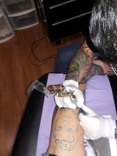 Tattoo Shop «Permanent Ink Tattoo & Piercing», reviews and photos, 3540 E Ponce de Leon Ave, Scottdale, GA 30079, USA