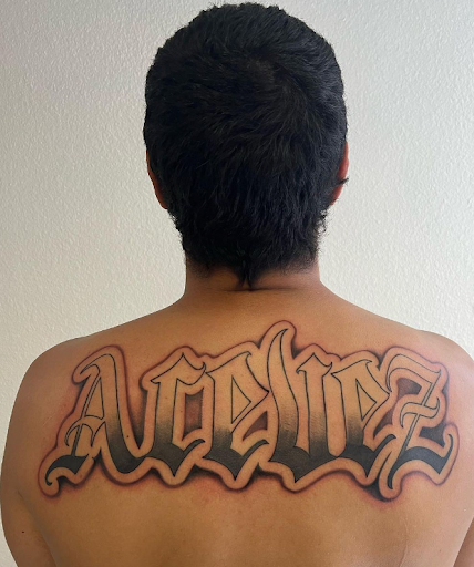 Explore thin blue line tattoo ideas, creative tattoo ideas in Orange, available at Top Floor Tattoo Studio