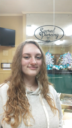 Explore power tattoo ideas, creative tattoo ideas in Erie, available at Sacred Piercing