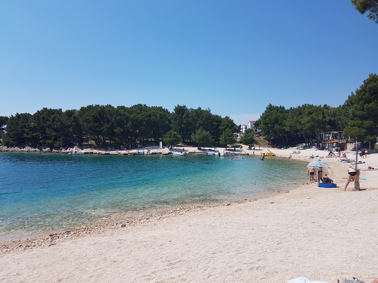 Photo of Porat beach with turquoise pure water surface