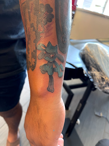 Explore leg tattoo ideas for men black, creative tattoo ideas in Palm Harbor, available at Angry Owl Tattoo and Piercing