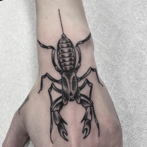 Explore tattooed wedding ring ideas, creative tattoo ideas in Edgewood, available at Wild Coyote Tattoo