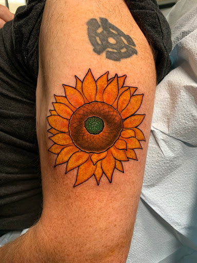 Find jewel tattoo ideas for your next unique tattoo in Arlington at Benchmark Tattoos