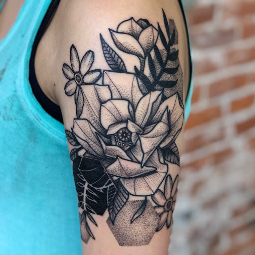 Explore chest piece tattoo ideas woman, creative tattoo ideas in Savannah, available at tattoos by delan