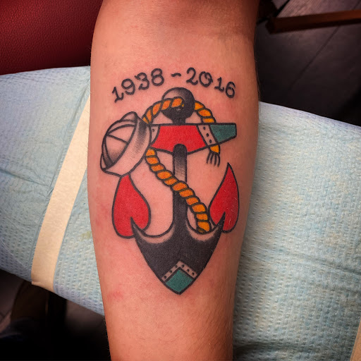 Explore color flower tattoo ideas, creative tattoo ideas in Denton, available at Black Anchor Tattoo