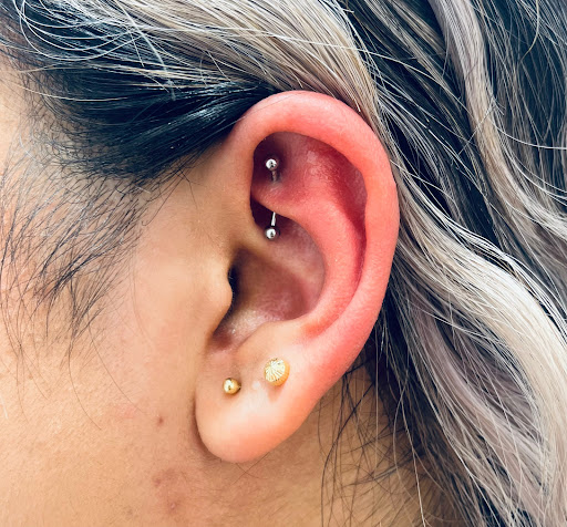 Explore mens angel tattoo ideas, creative tattoo ideas in Atlanta, available at Salamandra Piercing