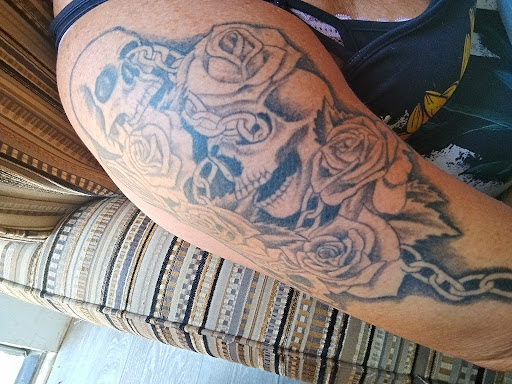 Explore round tattoo ideas, creative tattoo ideas in Woodstock, available at Electric Ink Tattoo