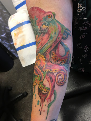 Explore rose tattoo ideas for females, creative tattoo ideas in Alamosa, available at Ink Pusher