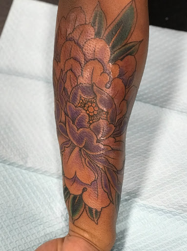 Find tattoo ideas for a mother for your next unique tattoo in Goose Creek at Red Kirin Tattoo