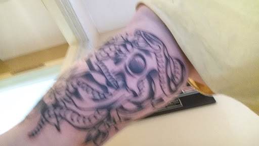 Explore cool guitar tattoo ideas, creative tattoo ideas in Saint Cloud, available at Olde Town Tattoo and Piercing