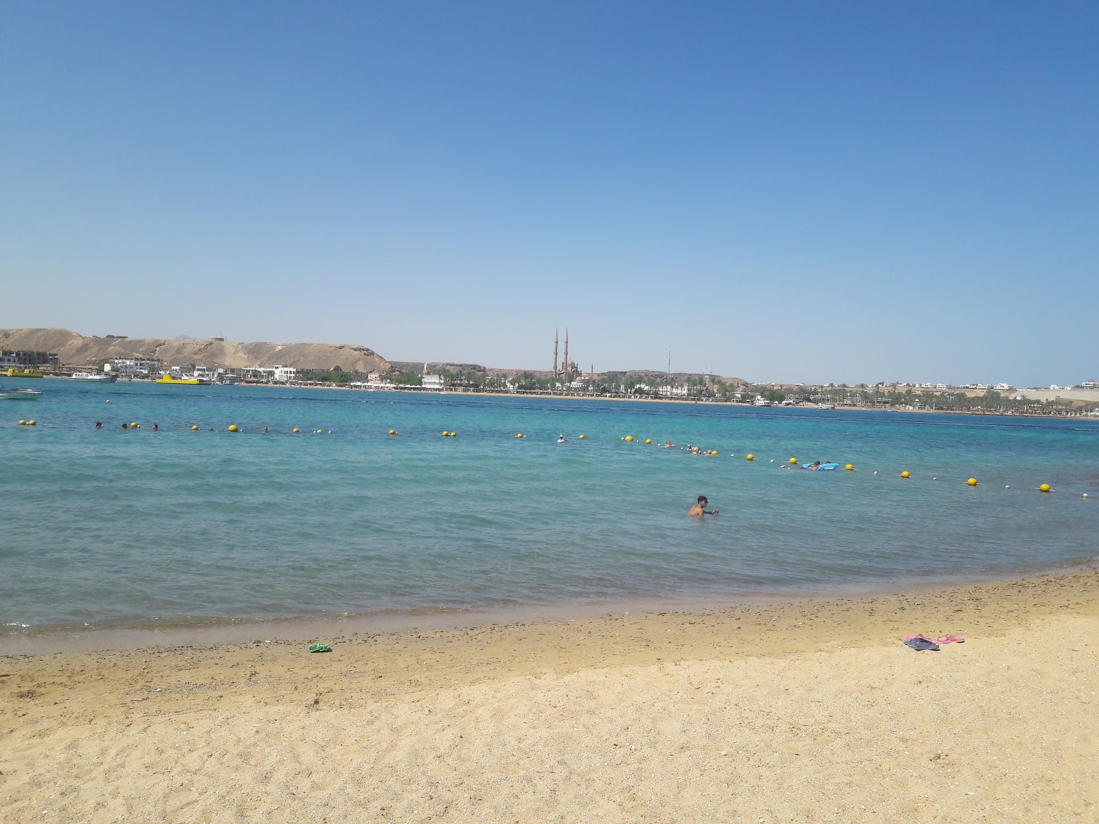 Photo of Hala beach with turquoise pure water surface
