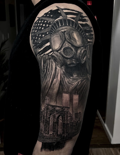 Explore batman logo tattoo ideas, creative tattoo ideas in Ozone Park, available at Rebel Ink Tattoo & Piercing
