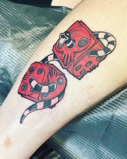 Explore fantasy book tattoo ideas, creative tattoo ideas in Cedar Falls, available at Tales Untold Tattoos