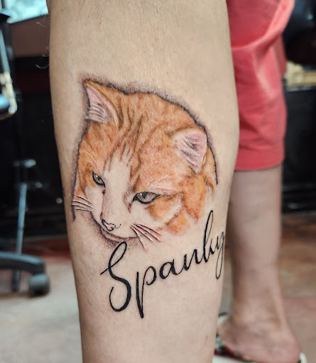 Explore michigan wolverines tattoo ideas, creative tattoo ideas in Inverness, available at The Perfect Spot Tattoos