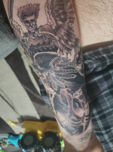 Explore gundam tattoo ideas, creative tattoo ideas in Granite City, available at DenWinn Art & Design