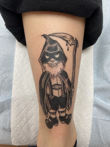 Explore woman leg tattoo ideas, creative tattoo ideas in Brick, available at Vision Tattoo