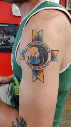 Explore dog ears tattoo ideas, creative tattoo ideas in Chandler, available at Rad-A-Tat Tattoo