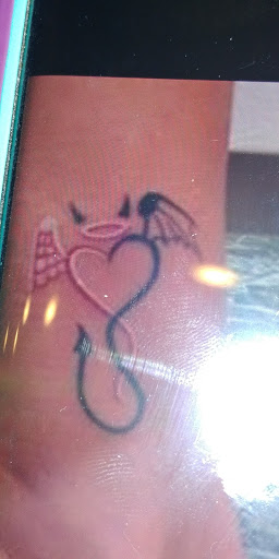 Explore american traditional chest tattoo ideas, creative tattoo ideas in Lakeland, available at Black Swan Tattoo