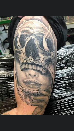 Explore snake tattoo ideas for females, creative tattoo ideas in Redding, available at Caddy Daddys