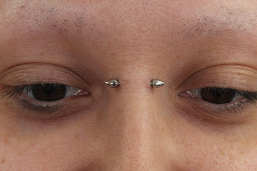 Explore serotonin tattoo ideas, creative tattoo ideas in Omaha, available at Sushi Balloon Body Piercing