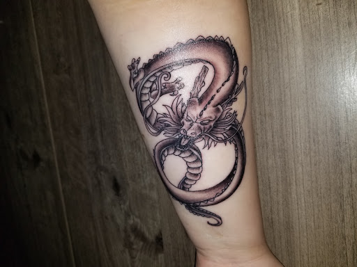 Tattoo Shop «Stained in pain tattoos», reviews and photos, 4211 N Milwaukee Ave, Chicago, IL 60641, USA