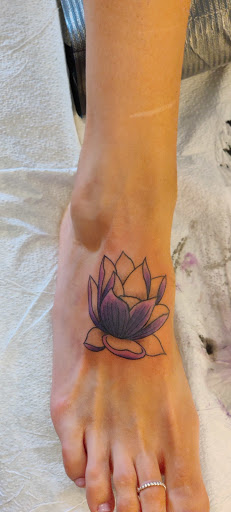 Explore flag tattoo ideas, creative tattoo ideas in Hebron, available at Explosive Ink Tattoo