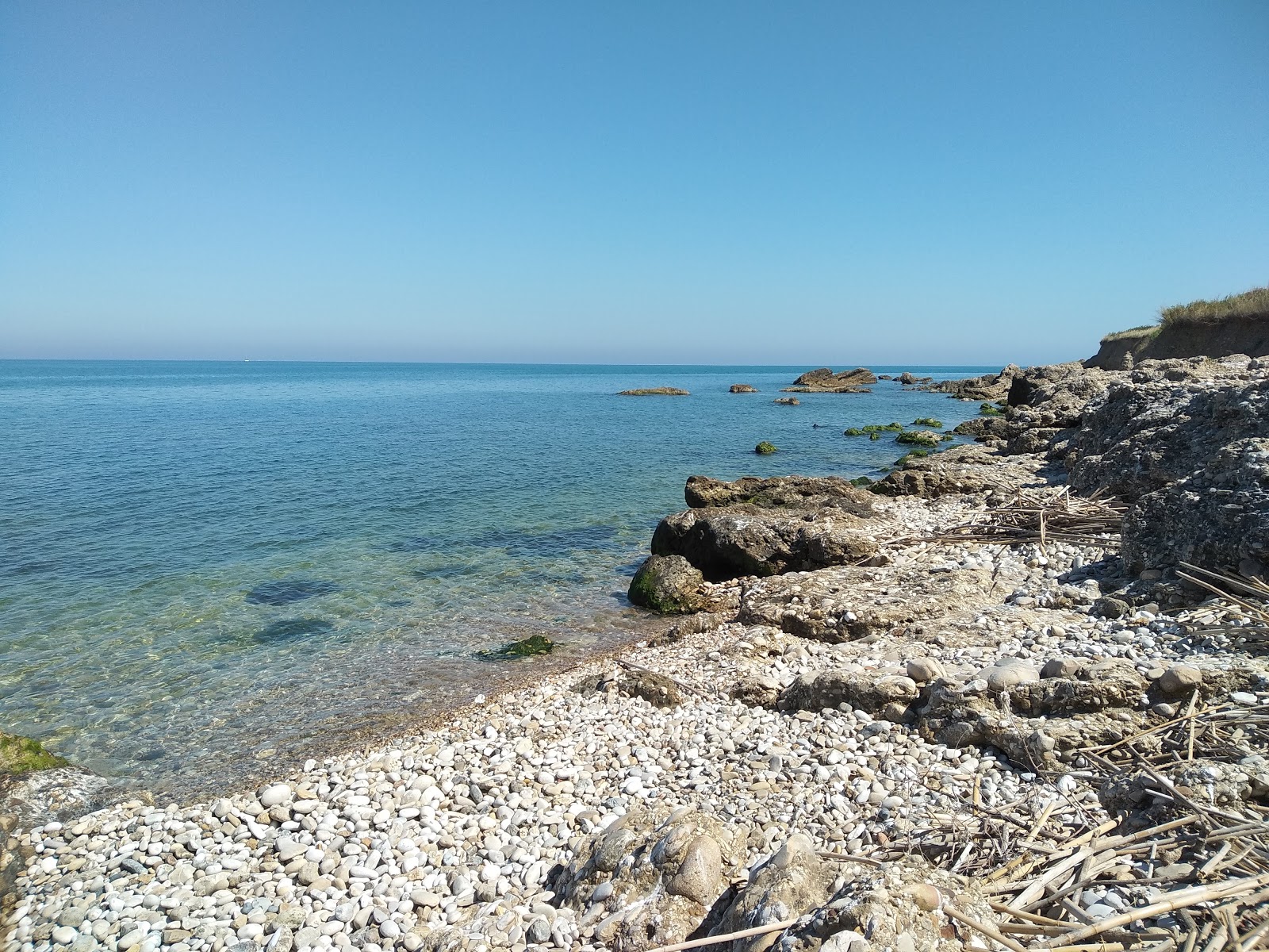 Fotografija Spiaggia della Foce Lebba z modra čista voda površino