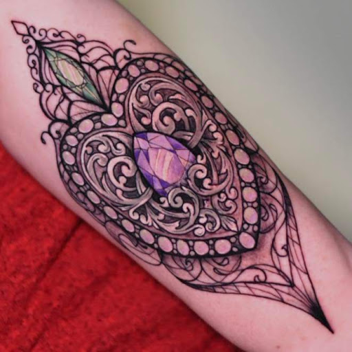 Explore mountaineering tattoo ideas, creative tattoo ideas in Greenfield, available at Garden of Eden Tattoos