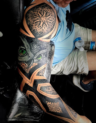 Explore back of forearm tattoo ideas, creative tattoo ideas in Fort Lauderdale, available at Righteous Ink Tattoo Body Piercing & Supply