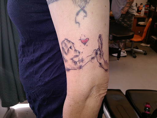 Explore tribal wolf tattoo ideas, creative tattoo ideas in Royston, available at Mad Tatter Tattoos