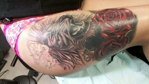 Explore badass tattoo ideas for women, creative tattoo ideas in Buffalo, available at Wishful Inking Tattoos & Piercings