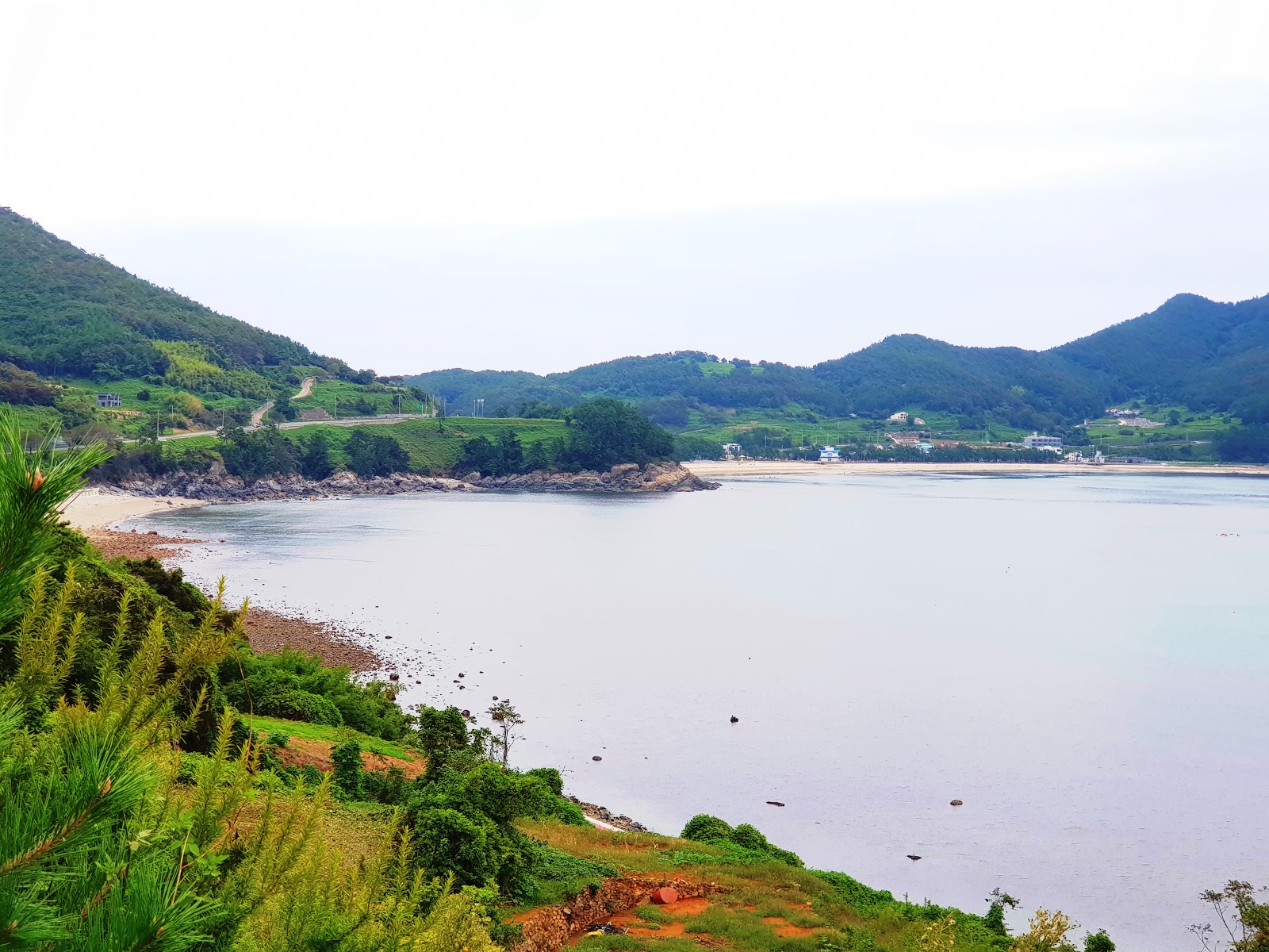 Cheonha Beach的照片 带有宽敞的海岸