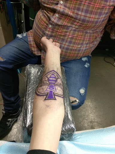 Explore ezra tattoo ideas, creative tattoo ideas in Artesia, available at Black Tie Affair Tattoo Parlor