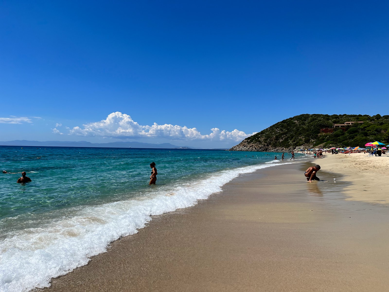 Foto van Spiaggia di Kal'e Moru met recht en lang